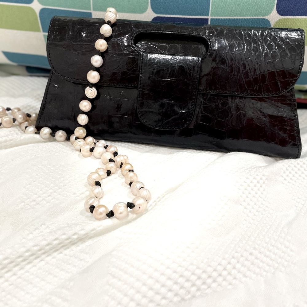 Black leather clutch
